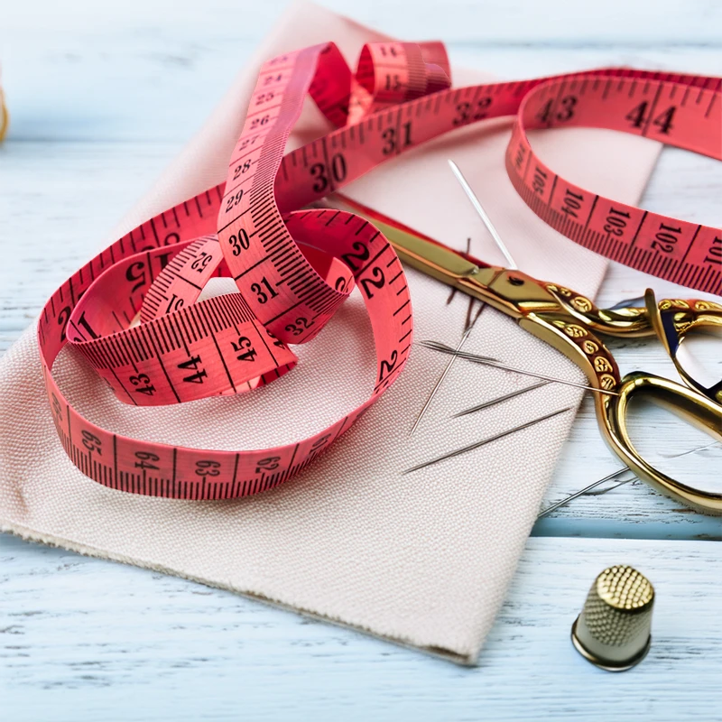 Maßband als Symbol für Maßnehmen